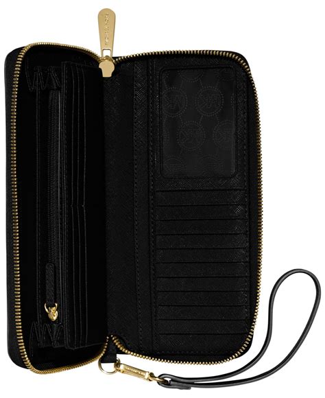 michael kors jet set women's leather travel continental wristlet wallet|michael kors black wristlet wallet.